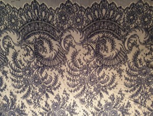 Navy scroll-border French Chantilly lace.